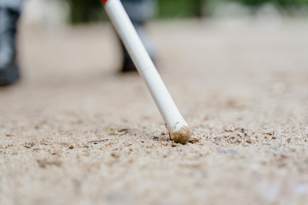 Clsoe-up of a White Cane on the Ground