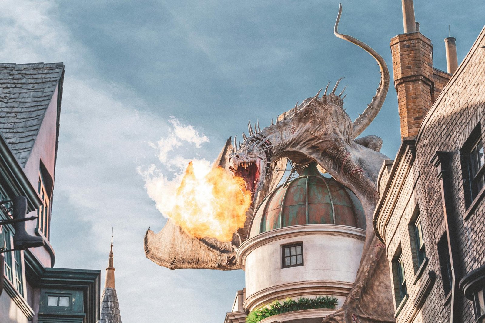 image Epic fire-breathing dragon atop building at Universal Studios, Orlando.